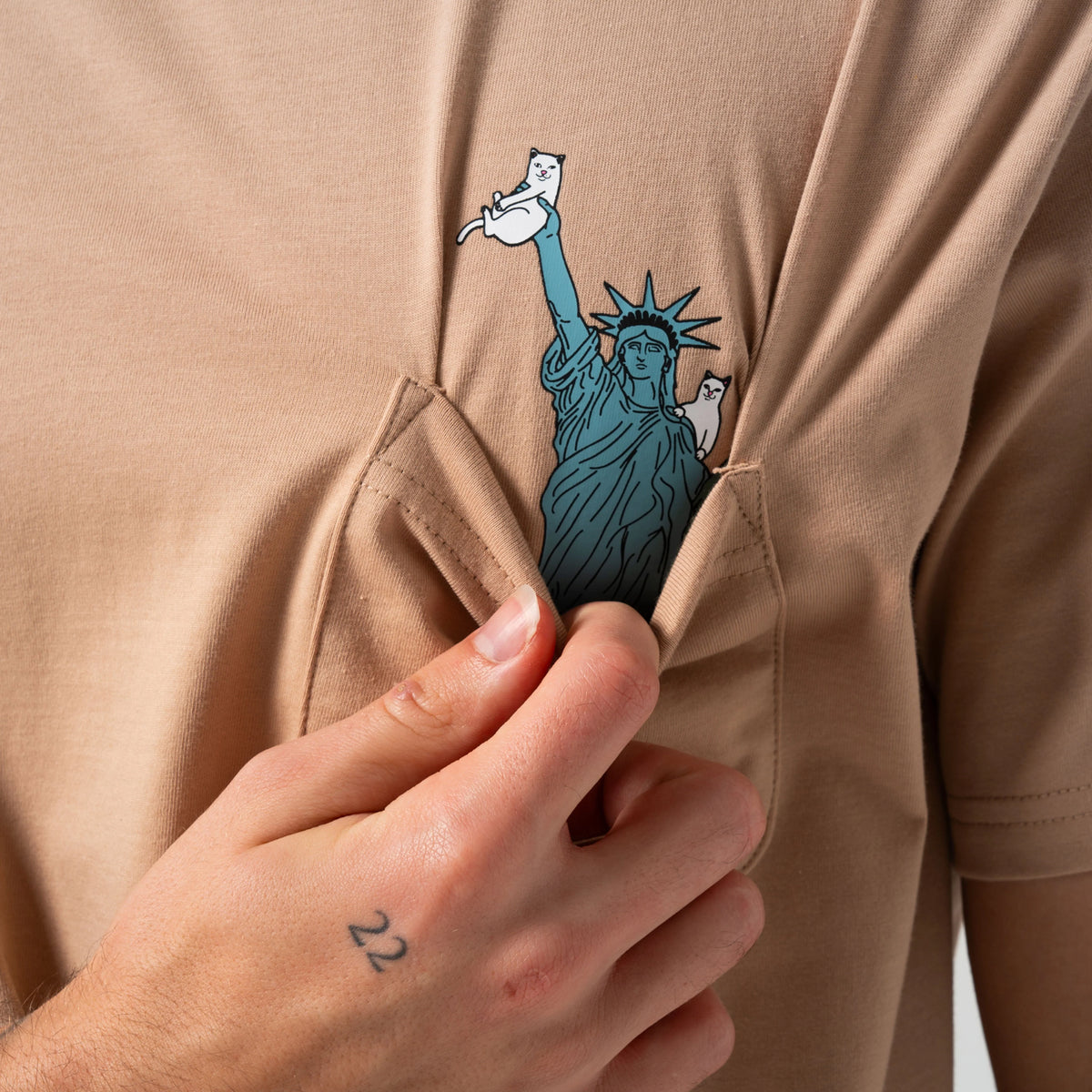 LIBERTY POCKET TEE ( ALMOND ) - RIPNDIP