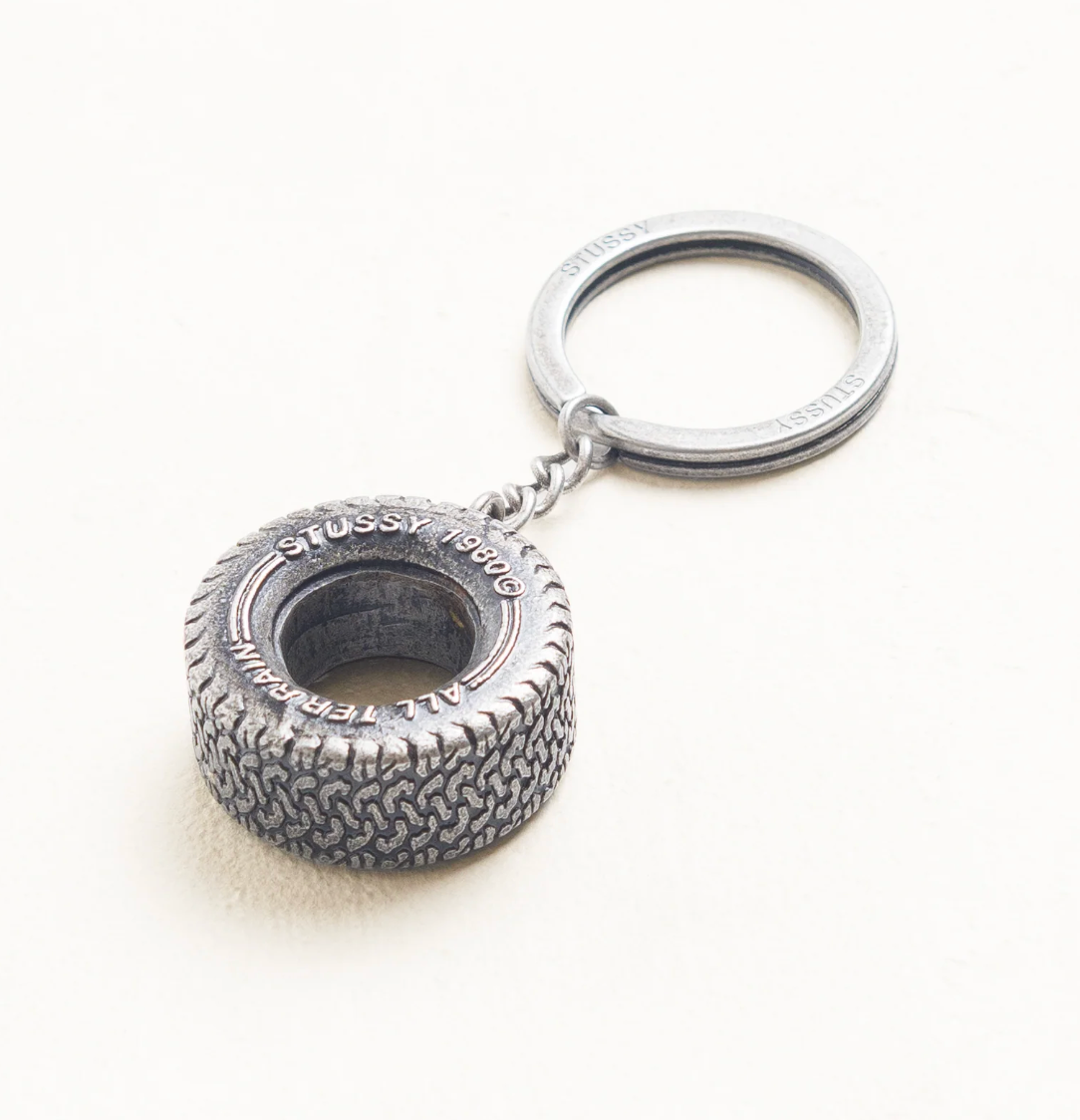 TIRE KEYCHAIN - STUSSY